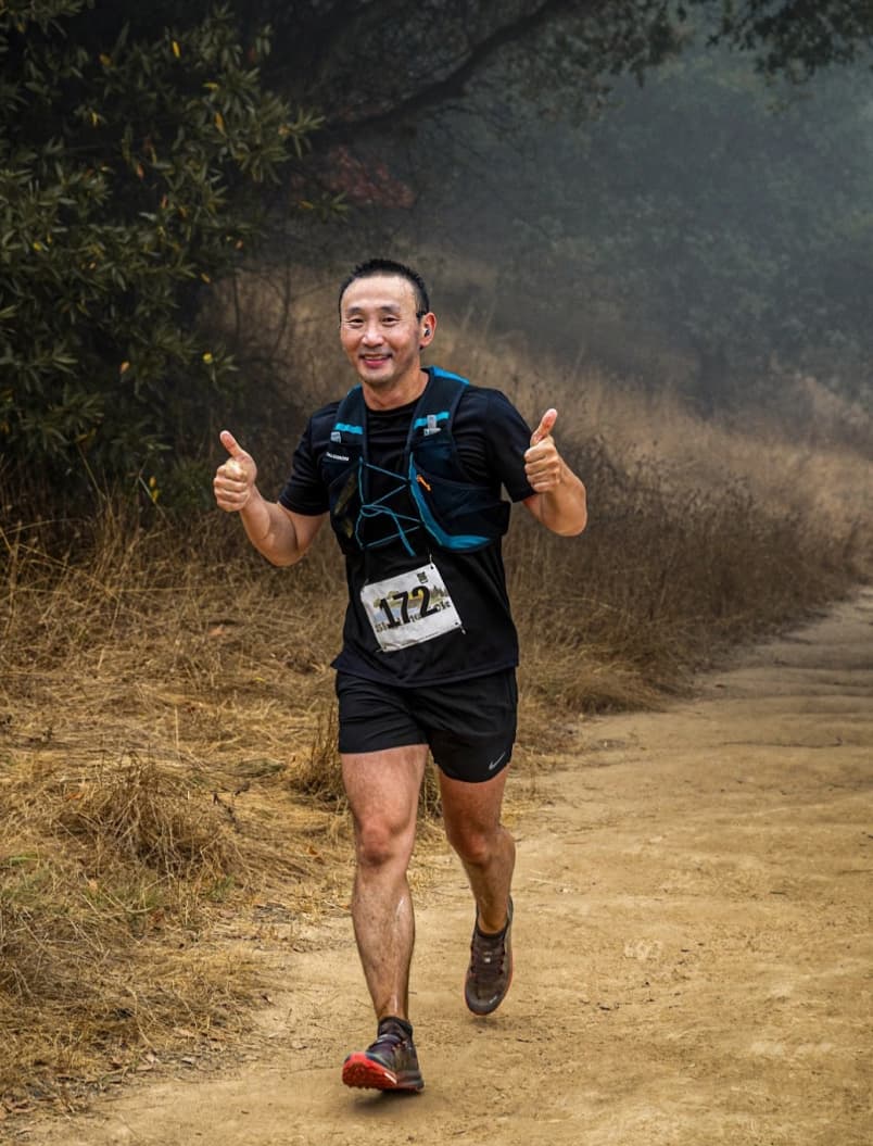 Tim running, showing his active lifestyle and fitness